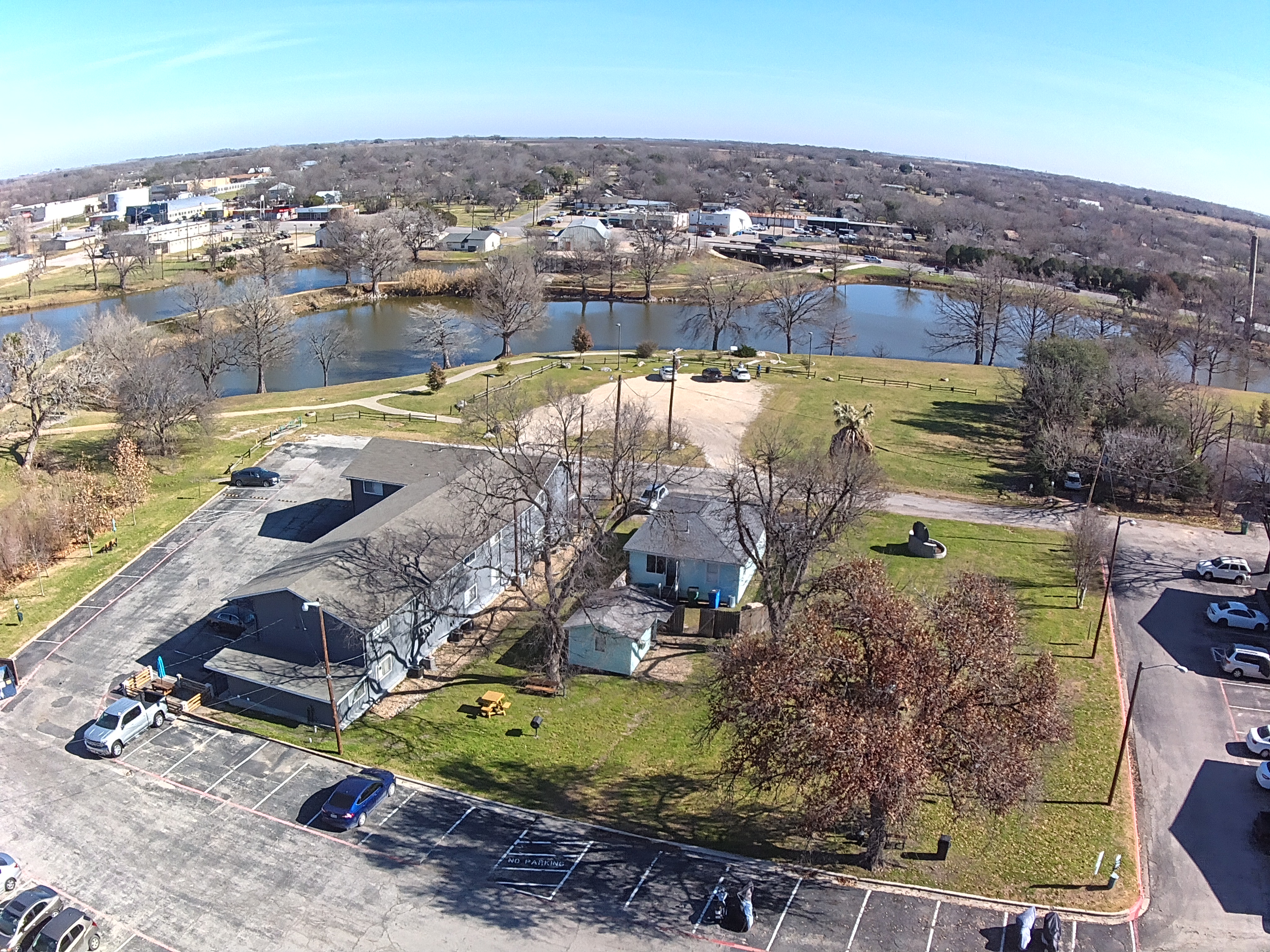 Aerial view of the lake behind Lakeside Apartments
